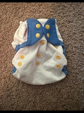 BumGenius White Diaper Cover with Blue Trim and Yellow Snaps